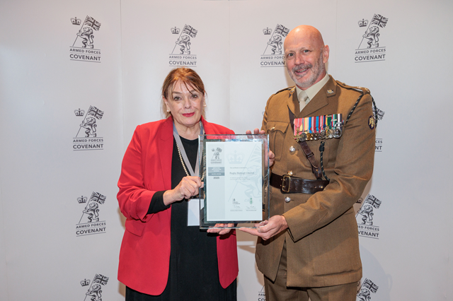 Cllr Maggie O'Rourke, Rugby Borough Council portfolio holder for partnerships and wellbeing, visited the National Memorial Arboretum to receive the council's Employer Recognition Scheme silver award from Lieutenant Colonel Keith Spiers.
